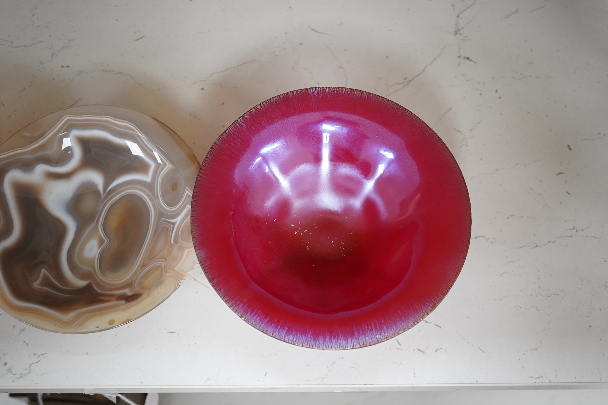 Two iridescent WMF art glass bowls and a polished agate bowl (3). Widest WMF bowl 16.5cm diameter. Condition - good